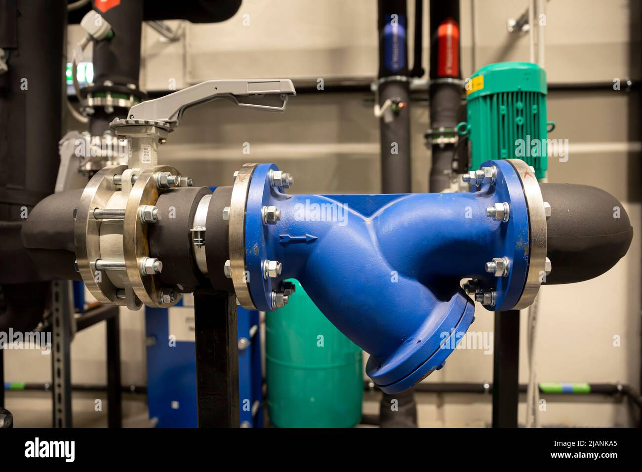 Cooling system of a supercomputer. Pipes with electrical motors. Stock Photo