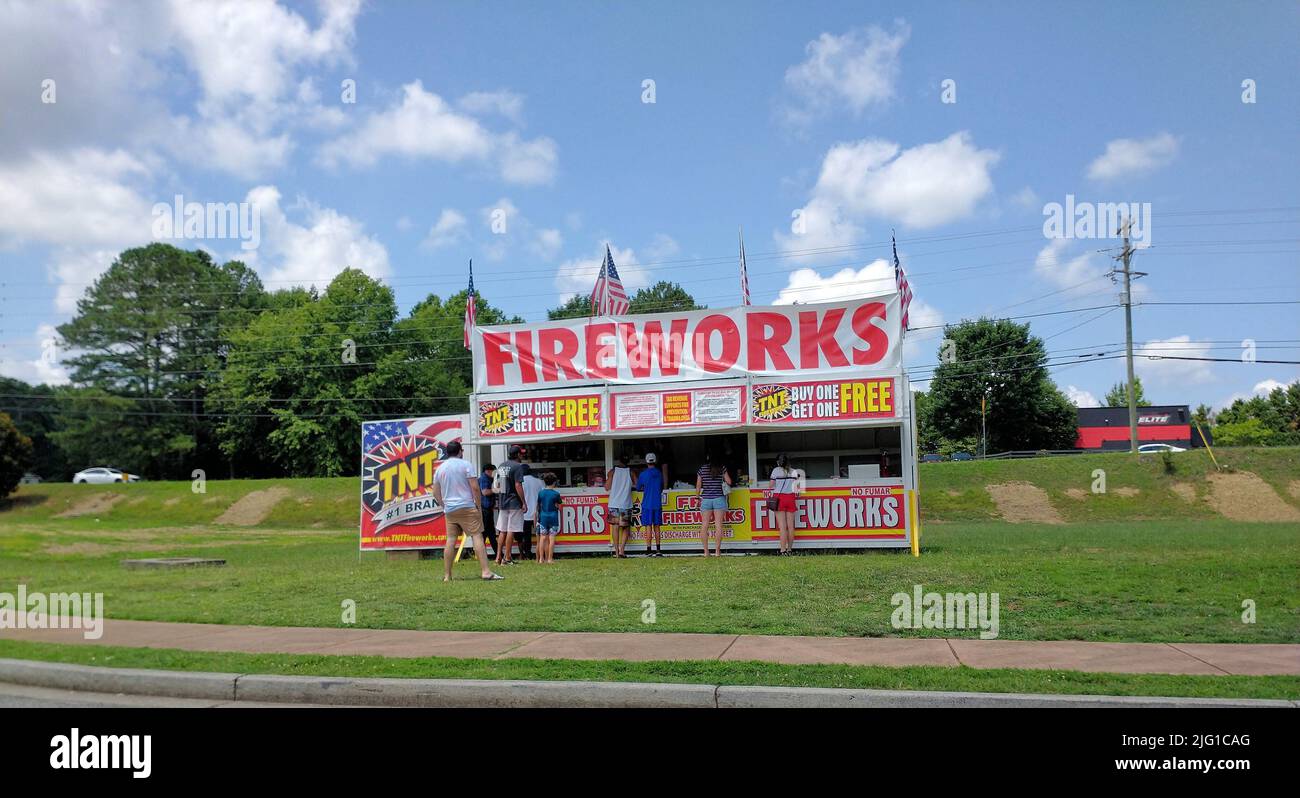 ALPHARETTA, GEORGIA - July 4, 2022: Fireworks are a class of pyrotechnic devices used for aesthetic and entertainment purposes. The most common use of Stock Photo