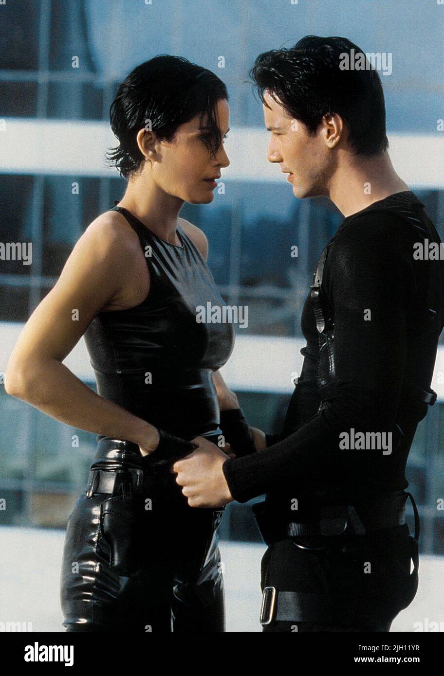 CARRIE-ANNE MOSS  KEANU REEVES, THE MATRIX, 1999 Stock Photo