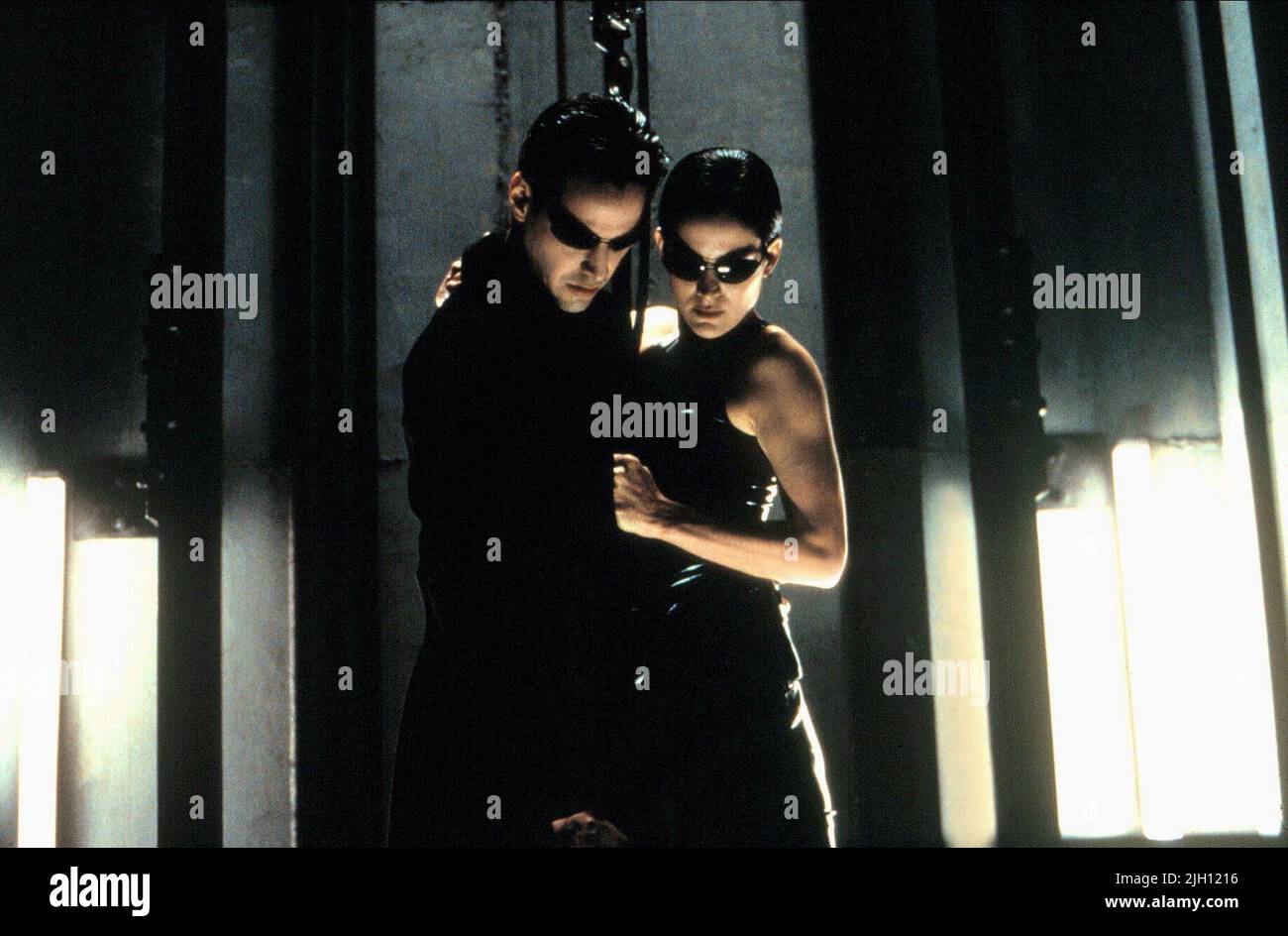 REEVES,MOSS, THE MATRIX, 1999 Stock Photo