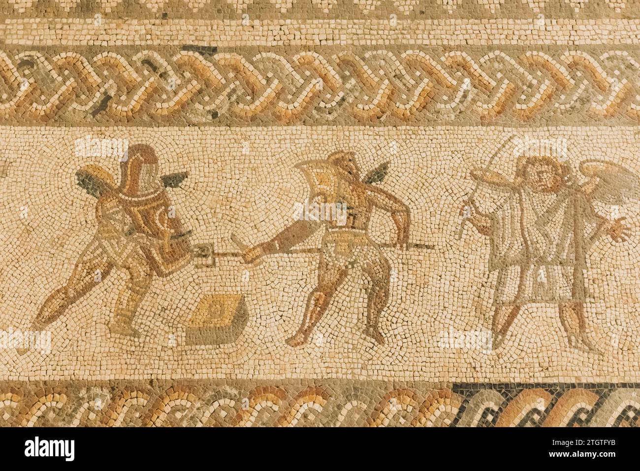 England, West Sussex, Bignor Roman Villa, Roman Mosaic depicting Gladiators Stock Photo