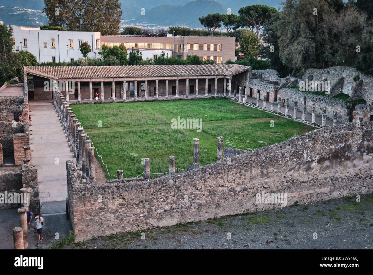 Naples, Italy - November 8 2023: Archaeological Park of Pompeii. Quadriporticus of the theaters or gladiator barracks Stock Photo