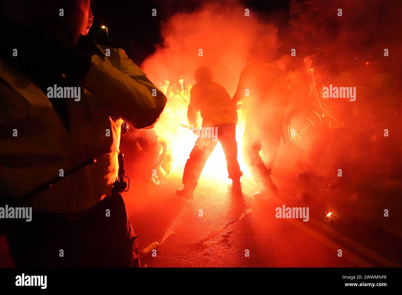 File photo dated 30/11/23 of Police attempt to put out flares that have thrown towards them outside the stadium before the UEFA Europa Conference League Group E match at Villa Park, Birmingham. Wales and Poland fans have been warned not to bring pyrotechnic devices to Tuesday’s Euro 2024 play-off final at Cardiff City Stadium. Seven Poland fans were arrested following a Nations League game between the two countries in Cardiff 18 months ago, including four for possession of pyrotechnics. The Europa Conference League match between Aston Villa and Legia Warsaw in November was also marred by crowd Stock Photo