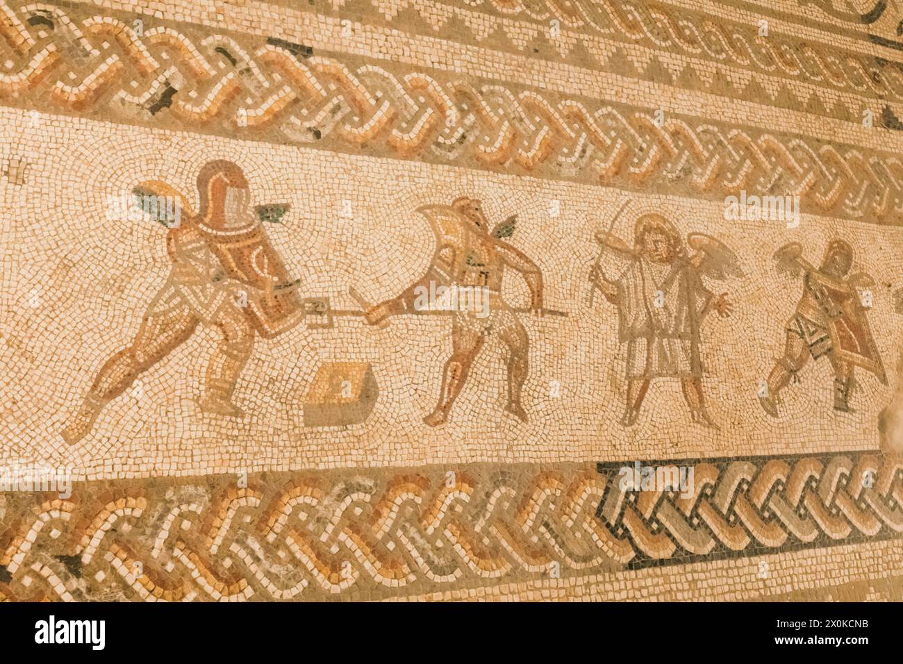 England, West Sussex, Bignor Roman Villa, Roman Mosaic depicting Gladiators Stock Photo