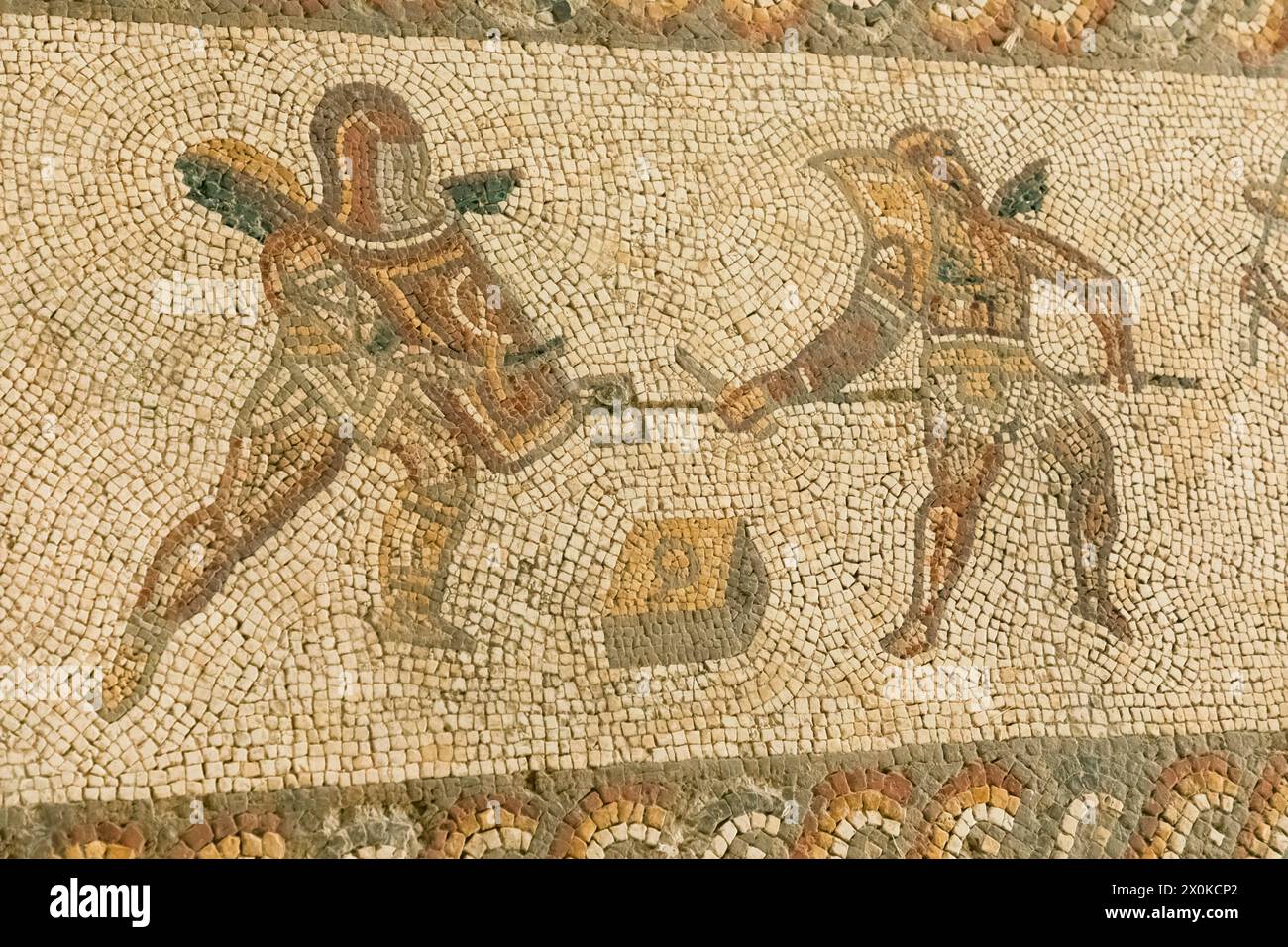 England, West Sussex, Bignor Roman Villa, Roman Mosaic depicting Gladiators Stock Photo