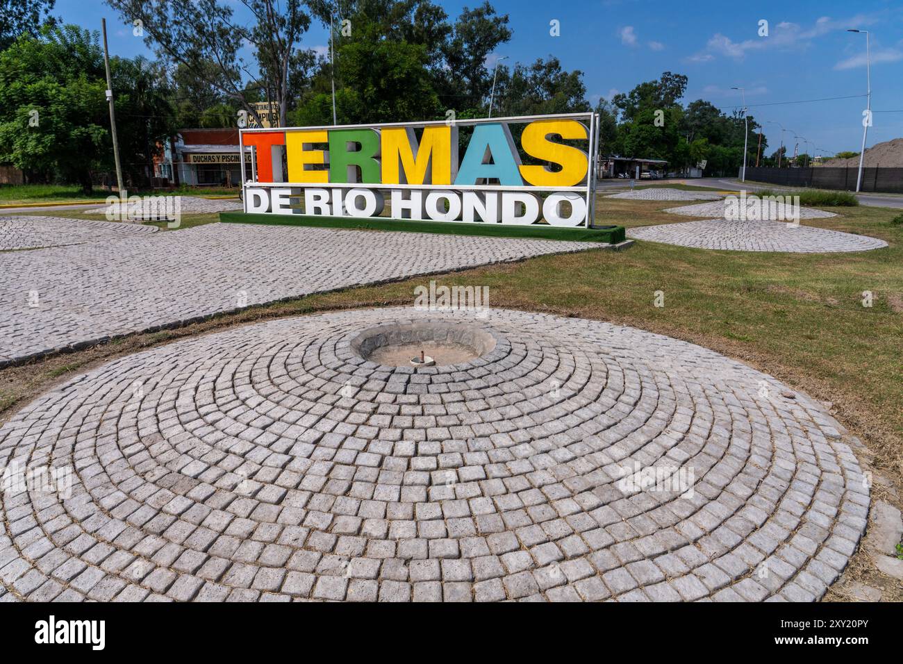 A painted metal sign in a roundabout on the outskirts of Termas de Rio Hondo, Argentina. Stock Photo