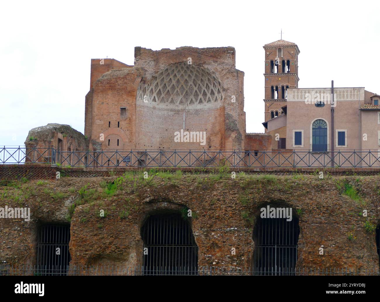 The Via Sacra (Sacred Road) was the main street of ancient Rome, leading from the top of the Capitoline Hill, through some of the most important religious sites of the Forum (where it is the widest street), to the Colosseum. Stock Photo