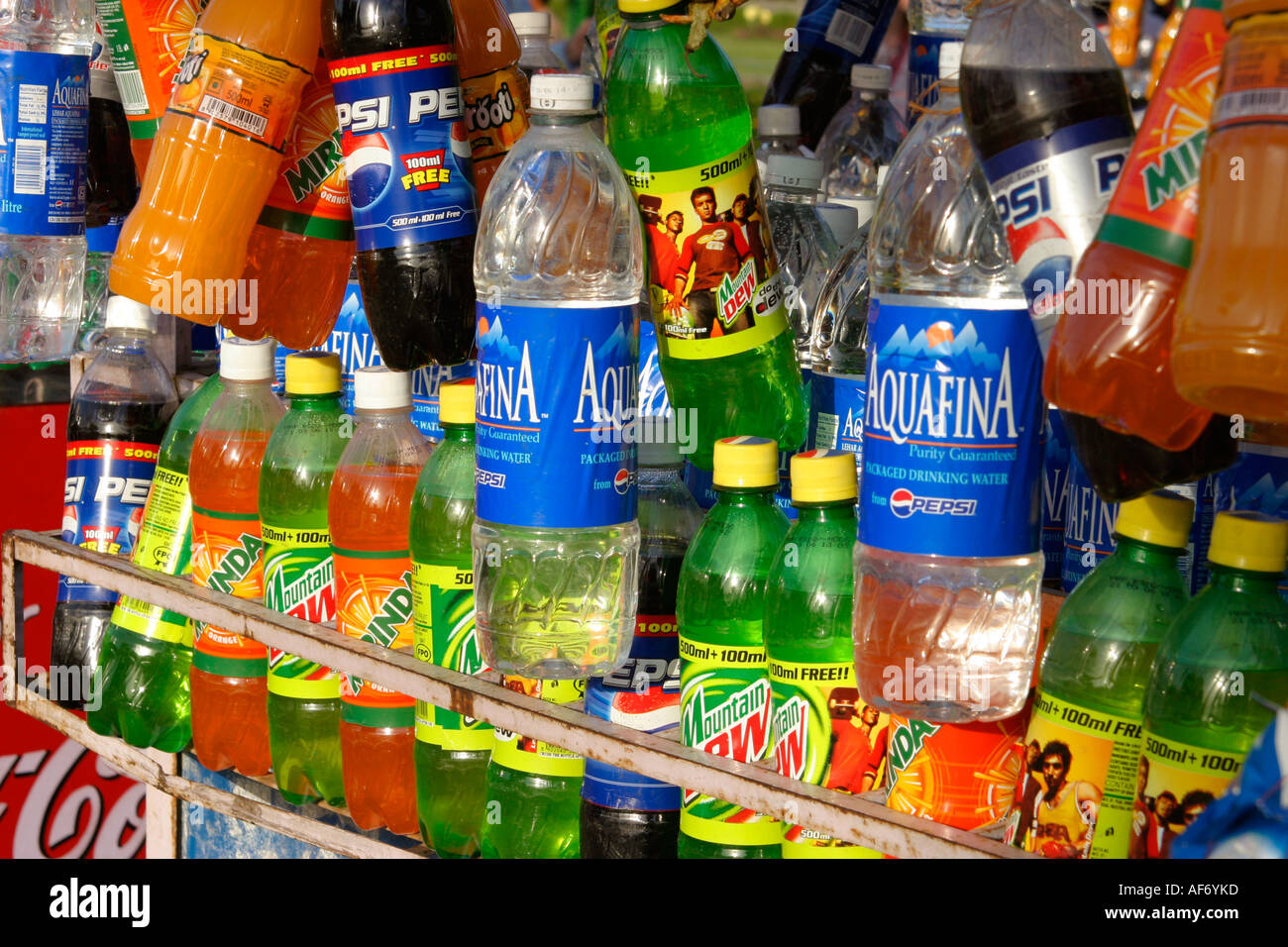 Plastic soft drinks bottles on stall, Delhi, India Stock Photo