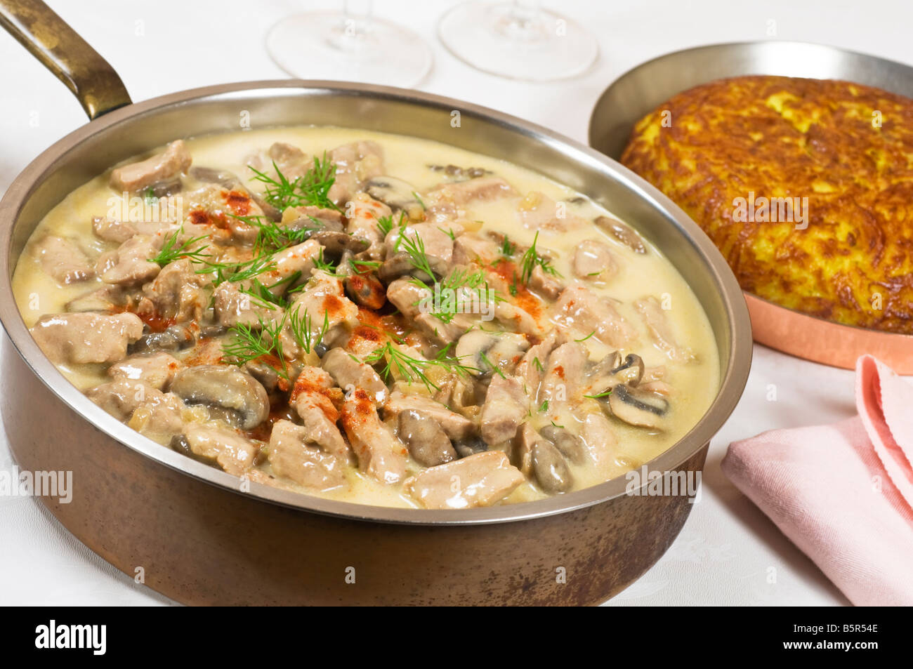 Veal Zurich style with rosti potatoes Switzerland Food Stock Photo