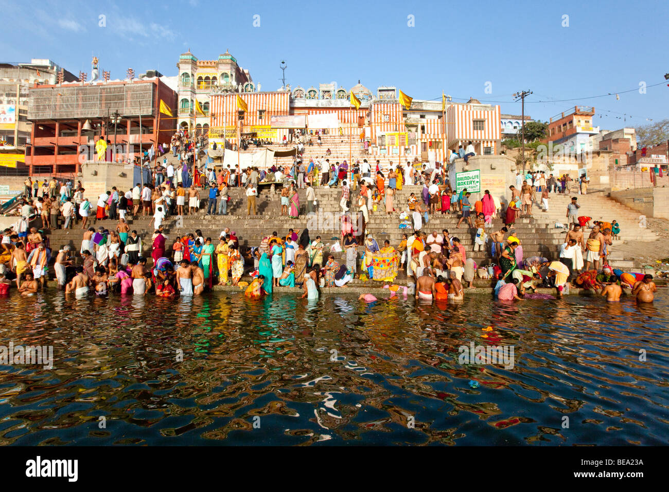 Bathing in the Ganges River at Nedar Ghat in Varanasi India Stock Photo