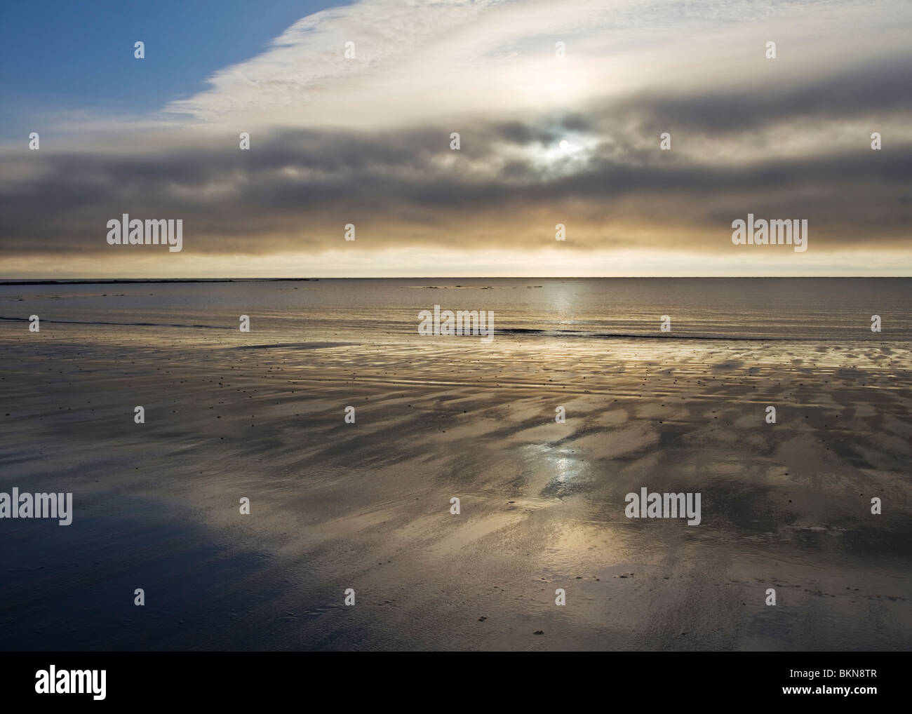 Sinister light over the beach at Low Hauxley on the Northumberland coast near Amble, England Stock Photo