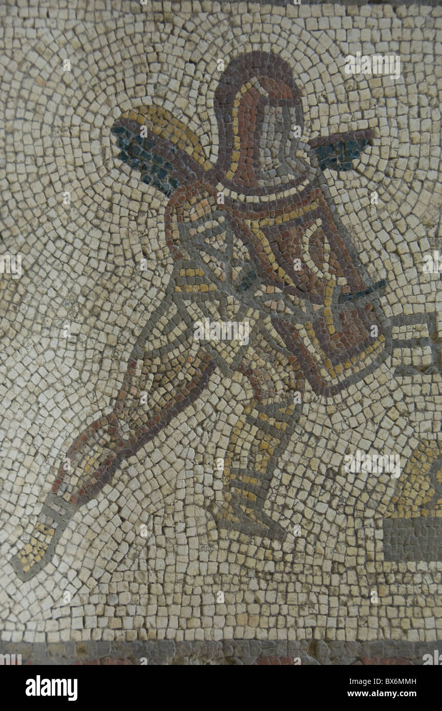 Detail of a gladiator from carpet border in mosaic dating from 350 AD, Roman Villa, Bignor, West Sussex, England, UK Stock Photo