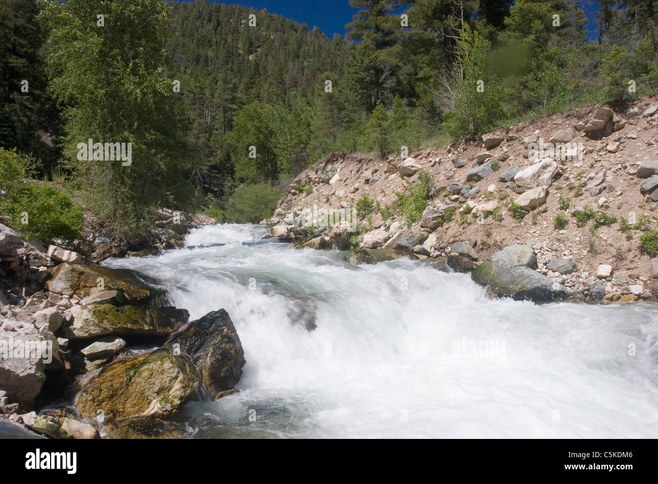 Rio Hondo flows swiftly in summer Stock Photo