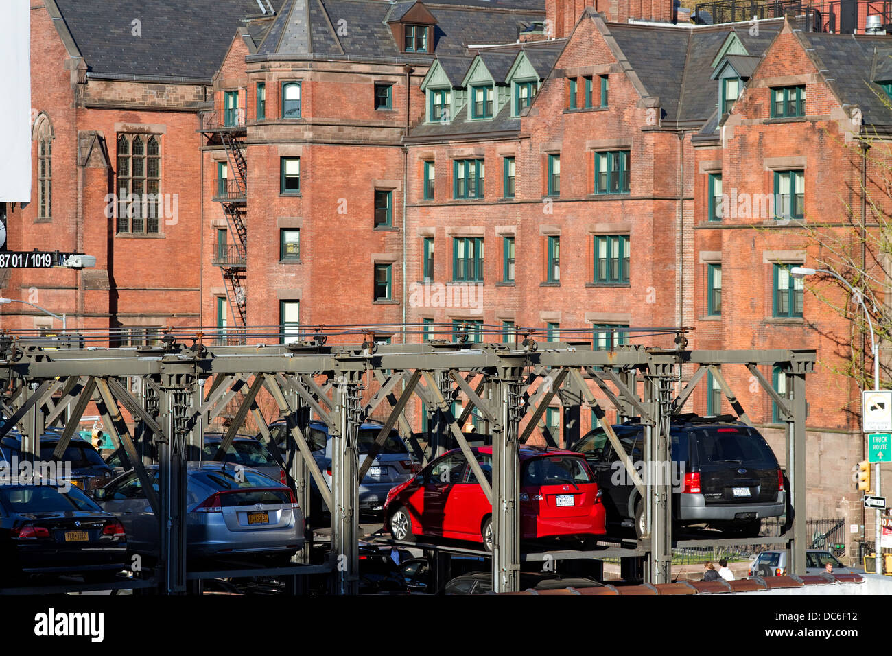 New York carpark, elevated parking garage with stacked cars. Stock Photo