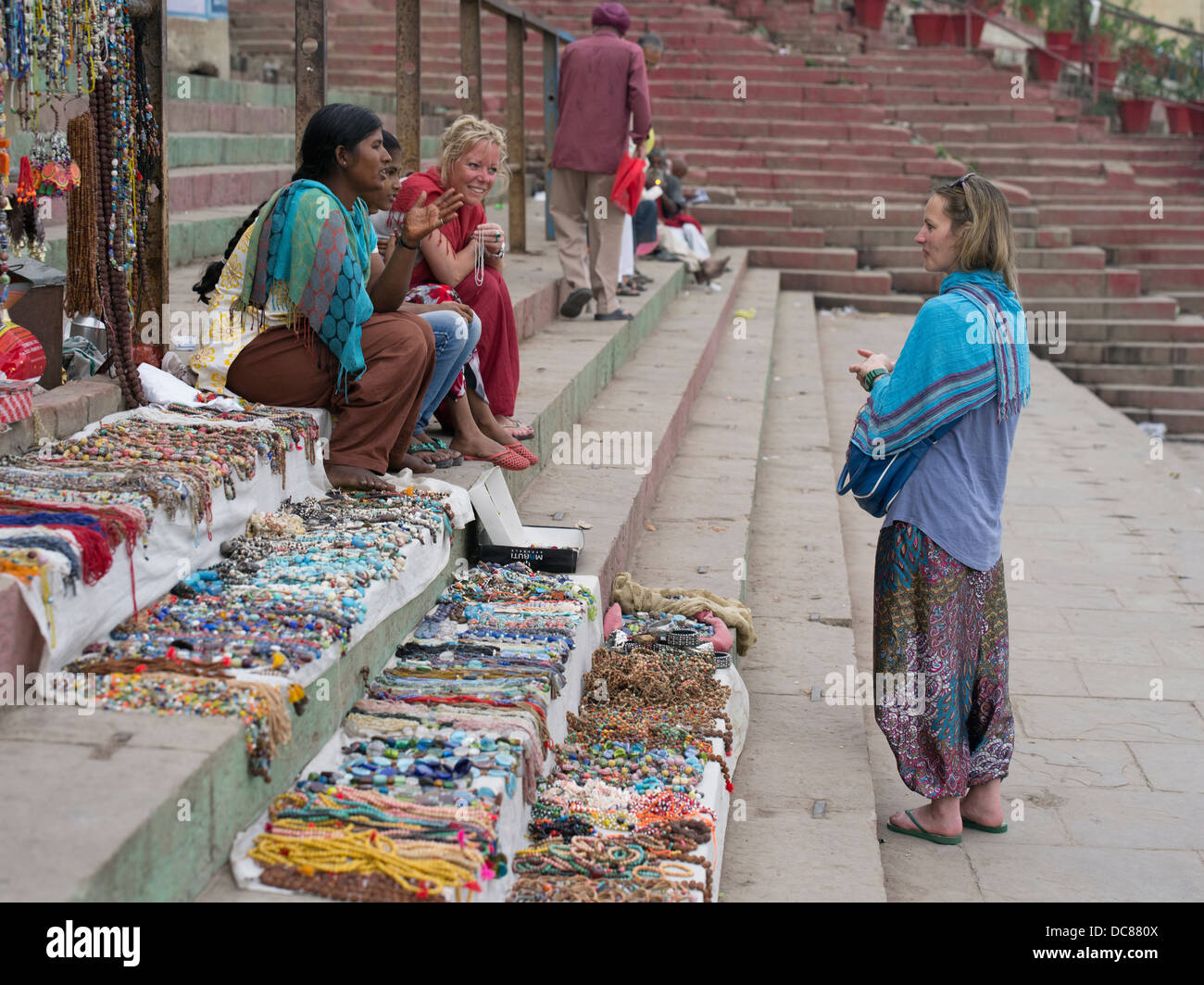 Souvenir shopping on the banks of the Ganges River - Varanasi, India Stock Photo