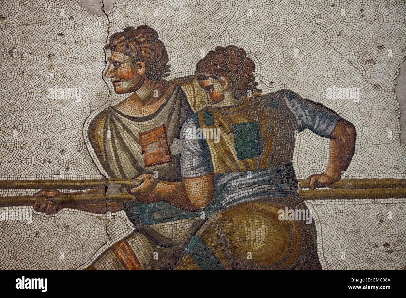 Ancient Mosaic in Great Palace Mosaic Museum in Istanbul, Turkey. Soldiers with spears fighting a tiger Stock Photo