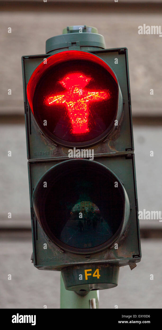 Ampelmannchen, the 'little traffic light man', pedestrian symbol in the former East Berlin. Red indicates stop and wait. Stock Photo