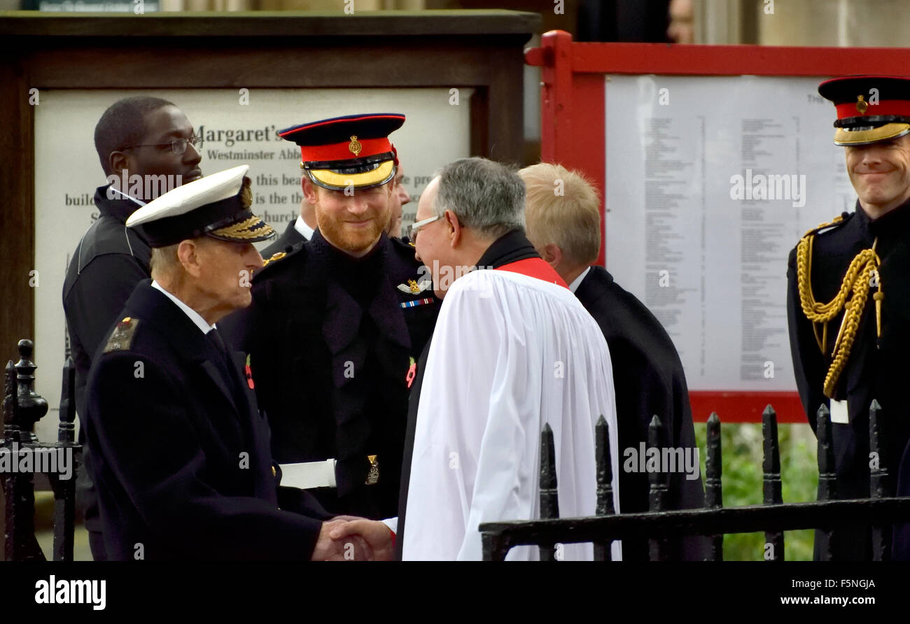 London, Nov 5th 2015. The Duke of Edinburgh and Prince Harry say goodbye to the Very Reverend John R Hall, dean of Westminster.. Stock Photo