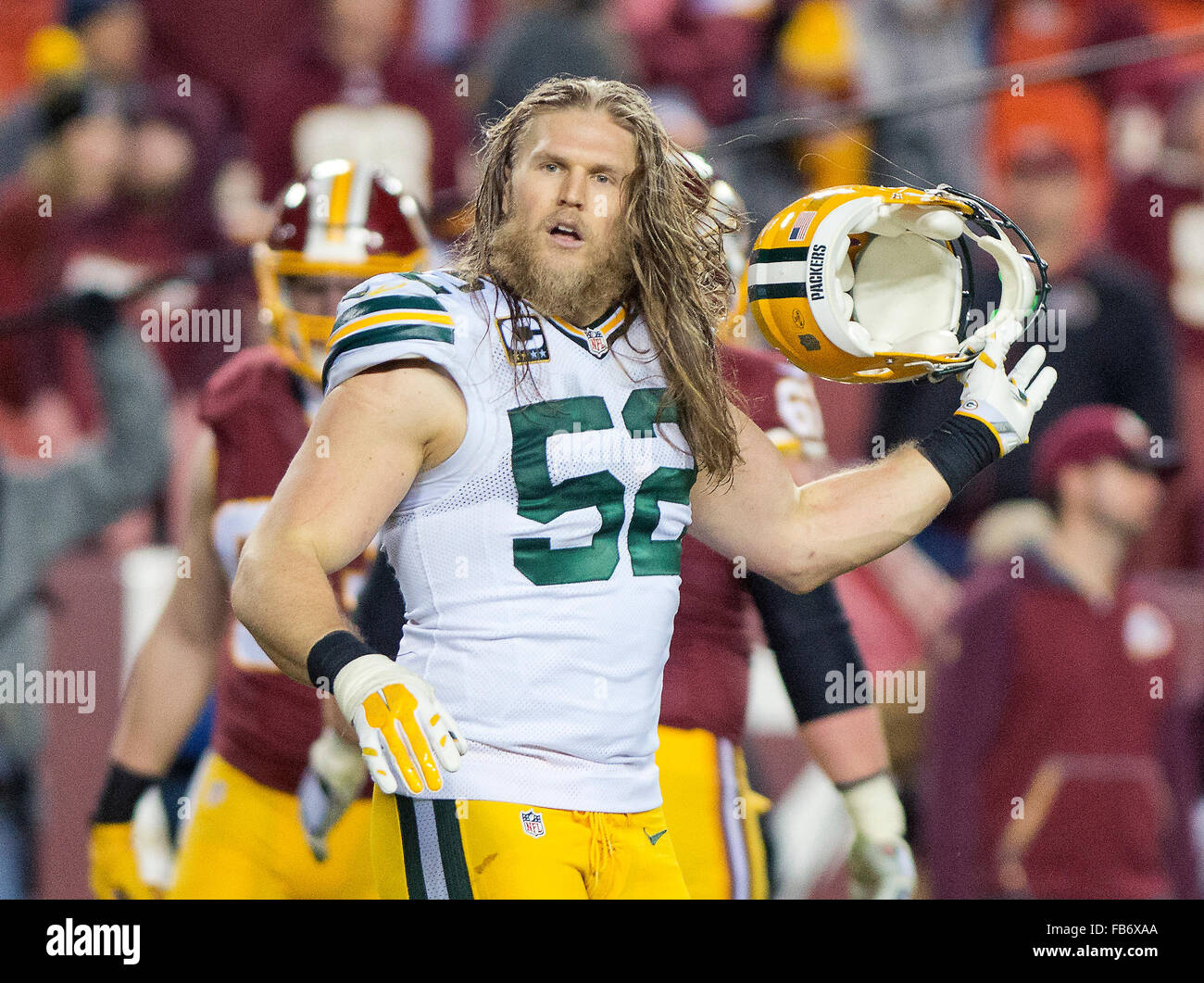 Green Bay Packers inside linebacker Clay Matthews (52) leaves the field after a fourth quarter defensive stand against the Washington Redskins in an NFC Wild Card game at FedEx Field in Landover, Maryland on Sunday, January 10, 2016. The Packers won the game 35 - 18. Credit: Ron Sachs/CNP - NO WIRE SERVICE - EDITORIAL USE ONLY unless licensed by the NFL Stock Photo