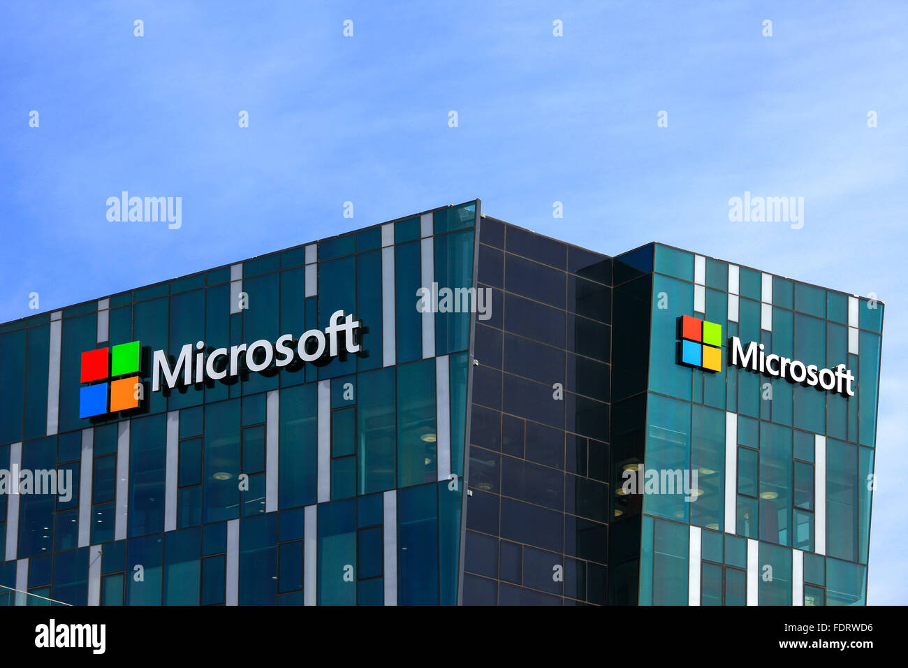 Microsoft logo and emblem. Microsoft is an international corporation that develops, supports and sells computer software and ser Stock Photo