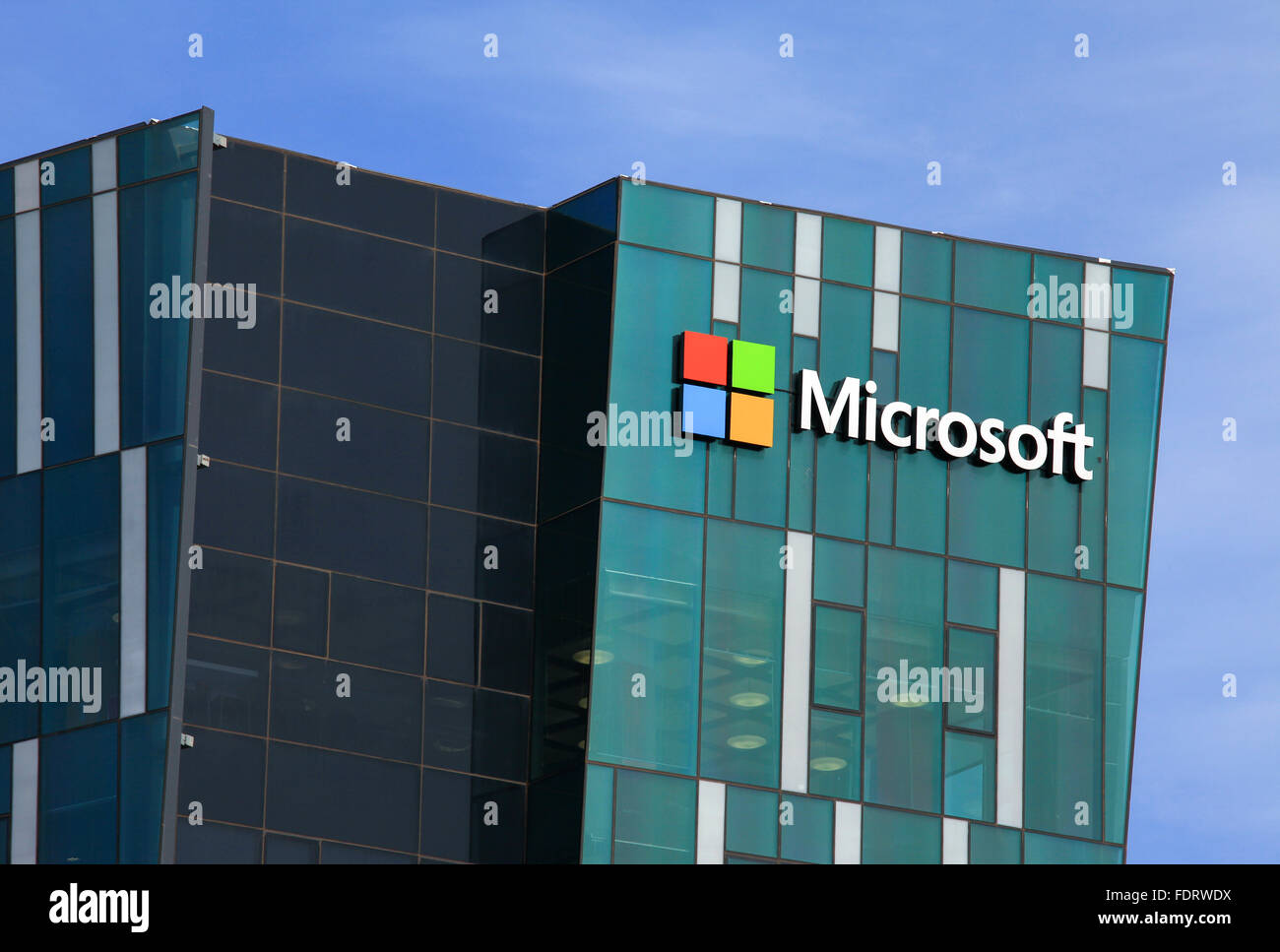 Microsoft logo and emblem. Microsoft is an international corporation that develops, supports and sells computer software and ser Stock Photo