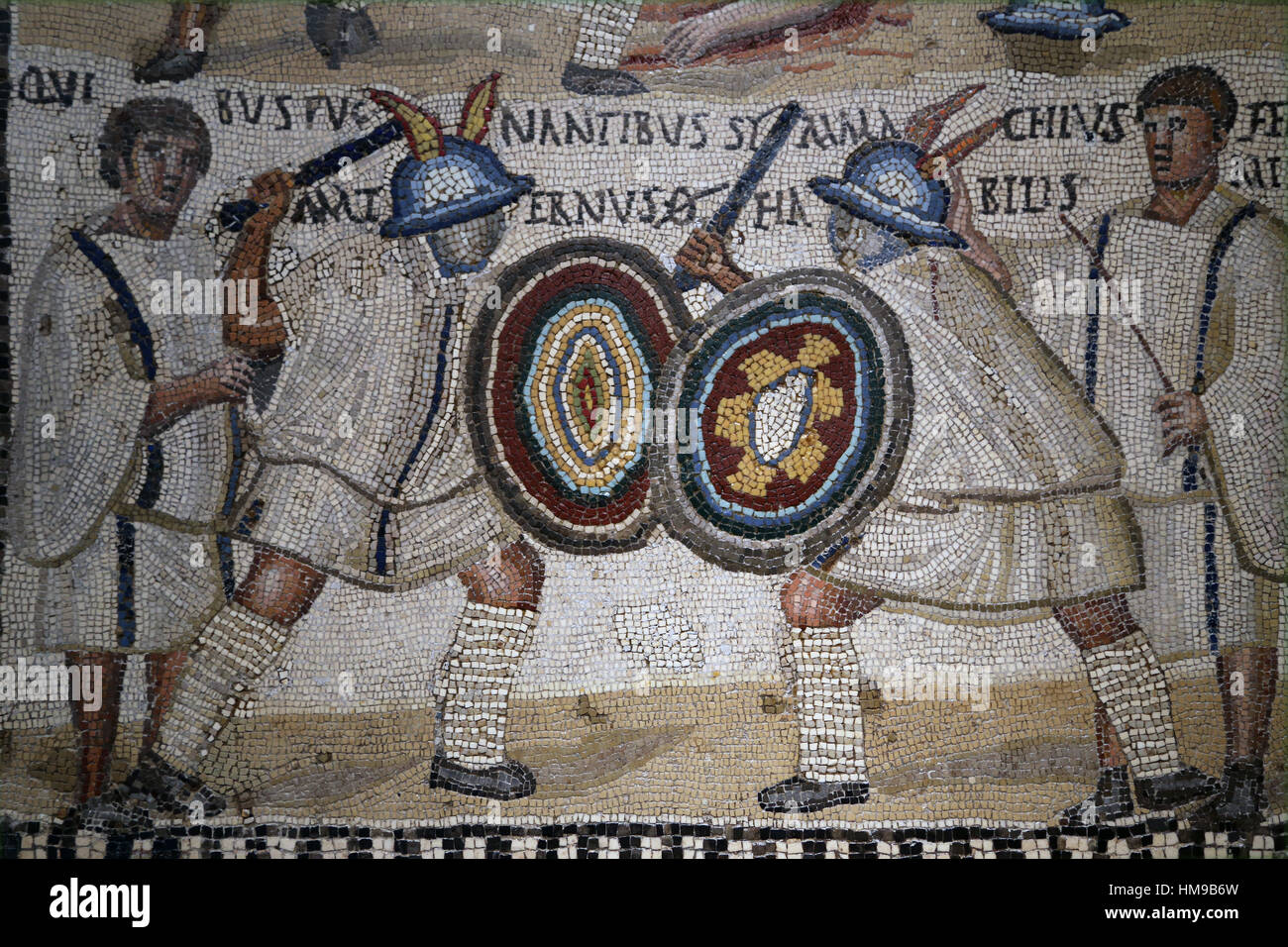 gladiator fight. Mosaic. 3rd century. Rome. Two Eques flanked by two lanistae. National Archaeological Museum, Madrid. Spain. Stock Photo