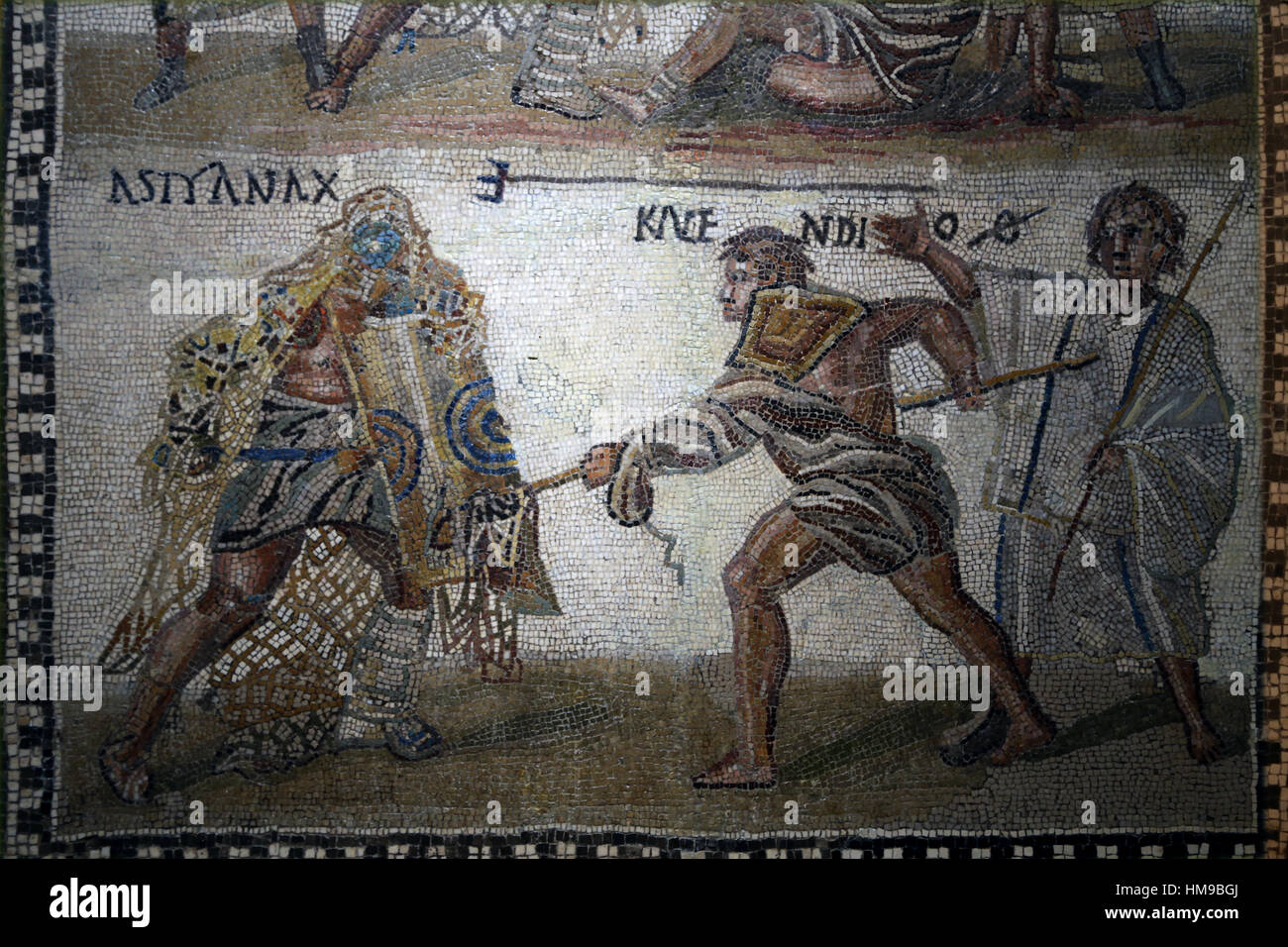 Secutor versus retiarius (net-fighter). Mosaic. Limestone. 3rd century. Rome. Detail lower frame. The retiarius Kalendio captures the seculor Astyanax Stock Photo