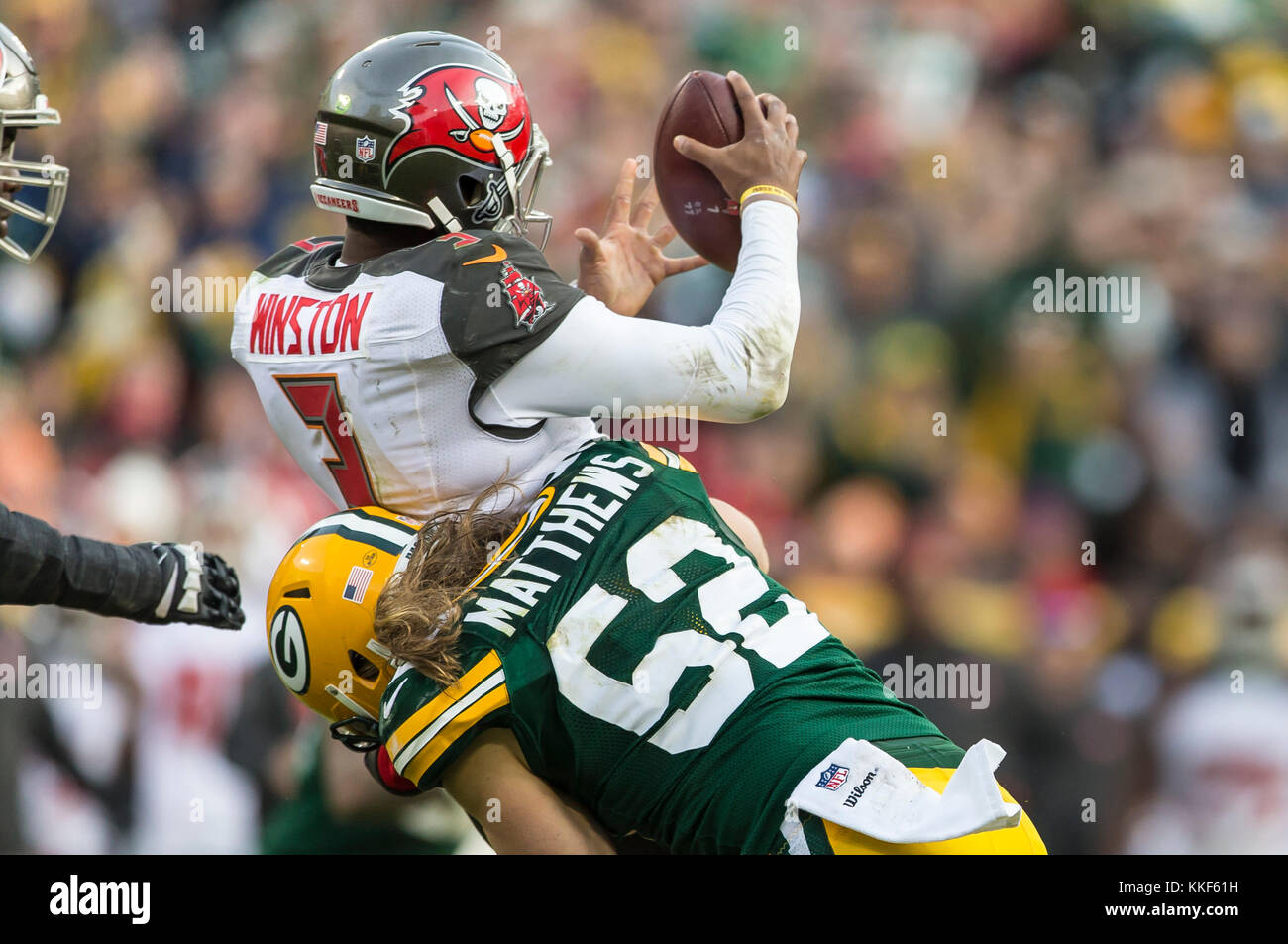 December 3, 2017: Green Bay Packers outside linebacker Clay Matthews #52 sacks Tampa Bay Buccaneers quarterback Jameis Winston #3 during the NFL Football game between the Tampa Bay Buccaneers and the Green Bay Packers at Lambeau Field in Green Bay, WI. Packers defeated the Buccaneers in overtime 26-20. John Fisher/CSM Stock Photo