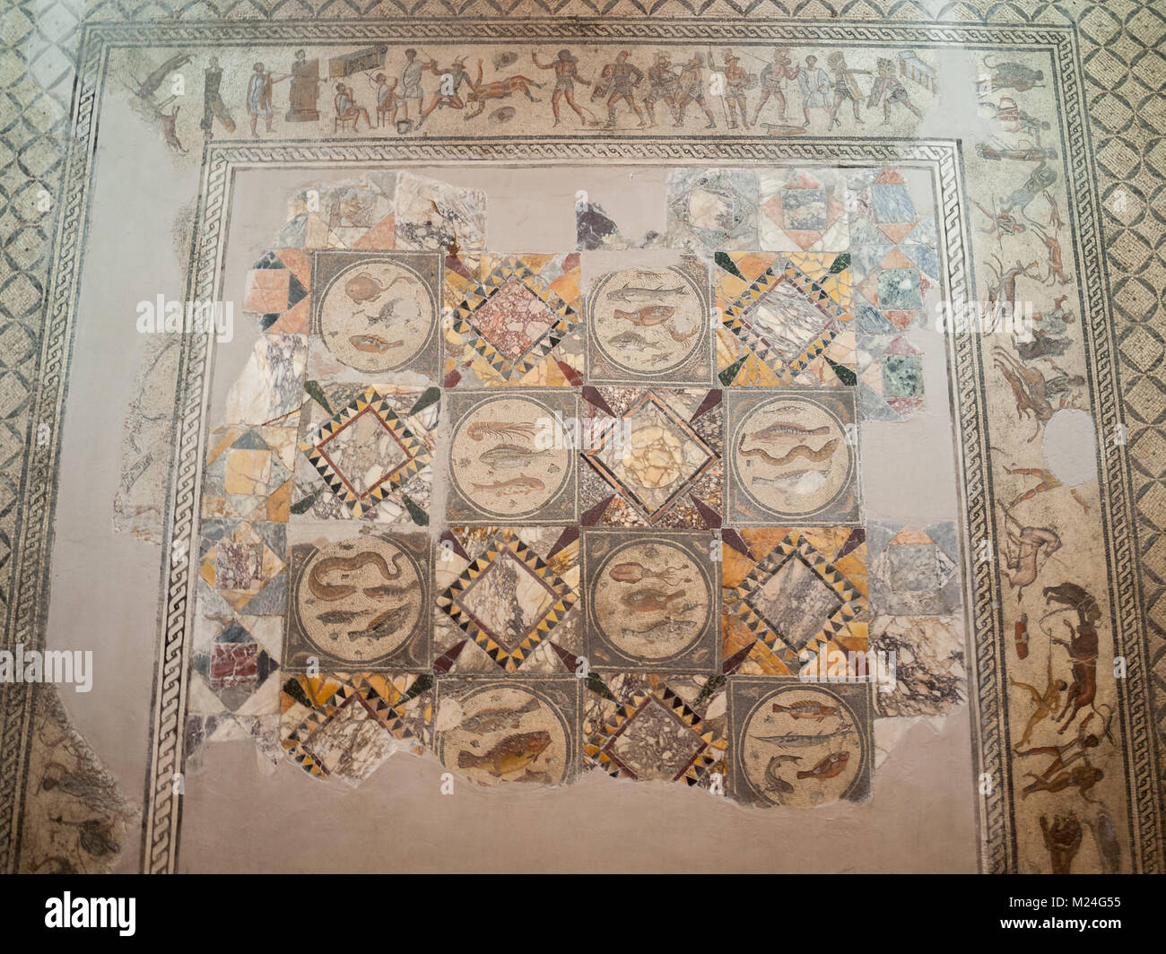 Tripoli's Jamahiriya Museum- mosaic from Leptis amphitheater with gladiators Stock Photo