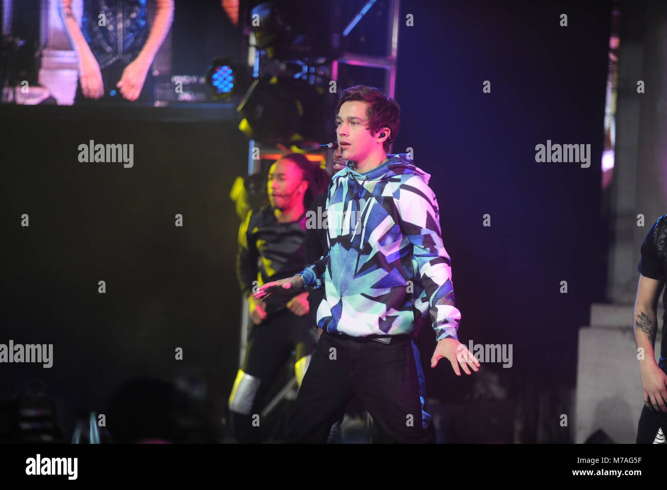 NEW YORK, NY - JANUARY 29: Austin Mahone performs onstage at the Aquafina FlavorSplash PepsiCo Super Bowl XLVIII celebration at Bryant Park on January 29, 2014 in New York City.   People:  Austin Mahone Stock Photo