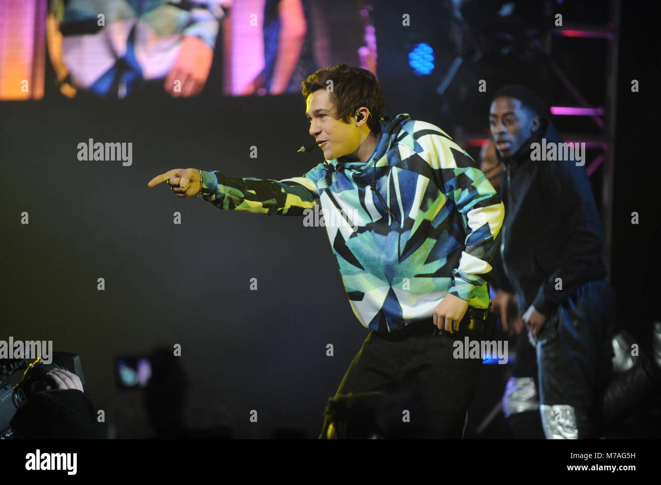 NEW YORK, NY - JANUARY 29: Austin Mahone performs onstage at the Aquafina FlavorSplash PepsiCo Super Bowl XLVIII celebration at Bryant Park on January 29, 2014 in New York City.   People:  Austin Mahone Stock Photo