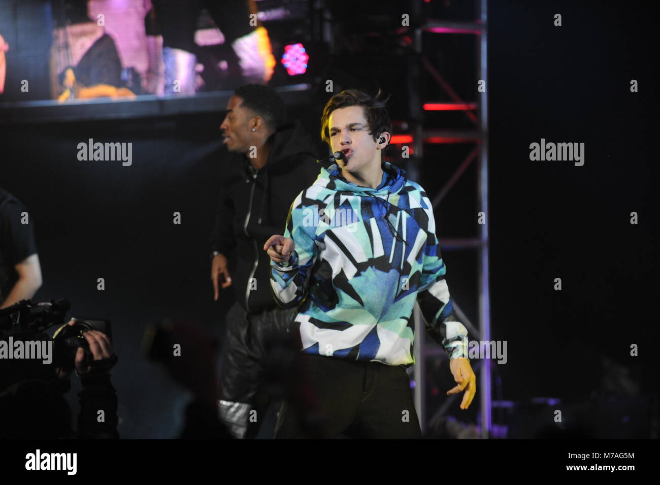 NEW YORK, NY - JANUARY 29: Austin Mahone performs onstage at the Aquafina FlavorSplash PepsiCo Super Bowl XLVIII celebration at Bryant Park on January 29, 2014 in New York City.   People:  Austin Mahone Stock Photo