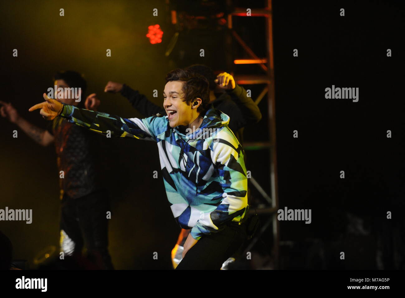 NEW YORK, NY - JANUARY 29: Austin Mahone performs onstage at the Aquafina FlavorSplash PepsiCo Super Bowl XLVIII celebration at Bryant Park on January 29, 2014 in New York City.   People:  Austin Mahone Stock Photo