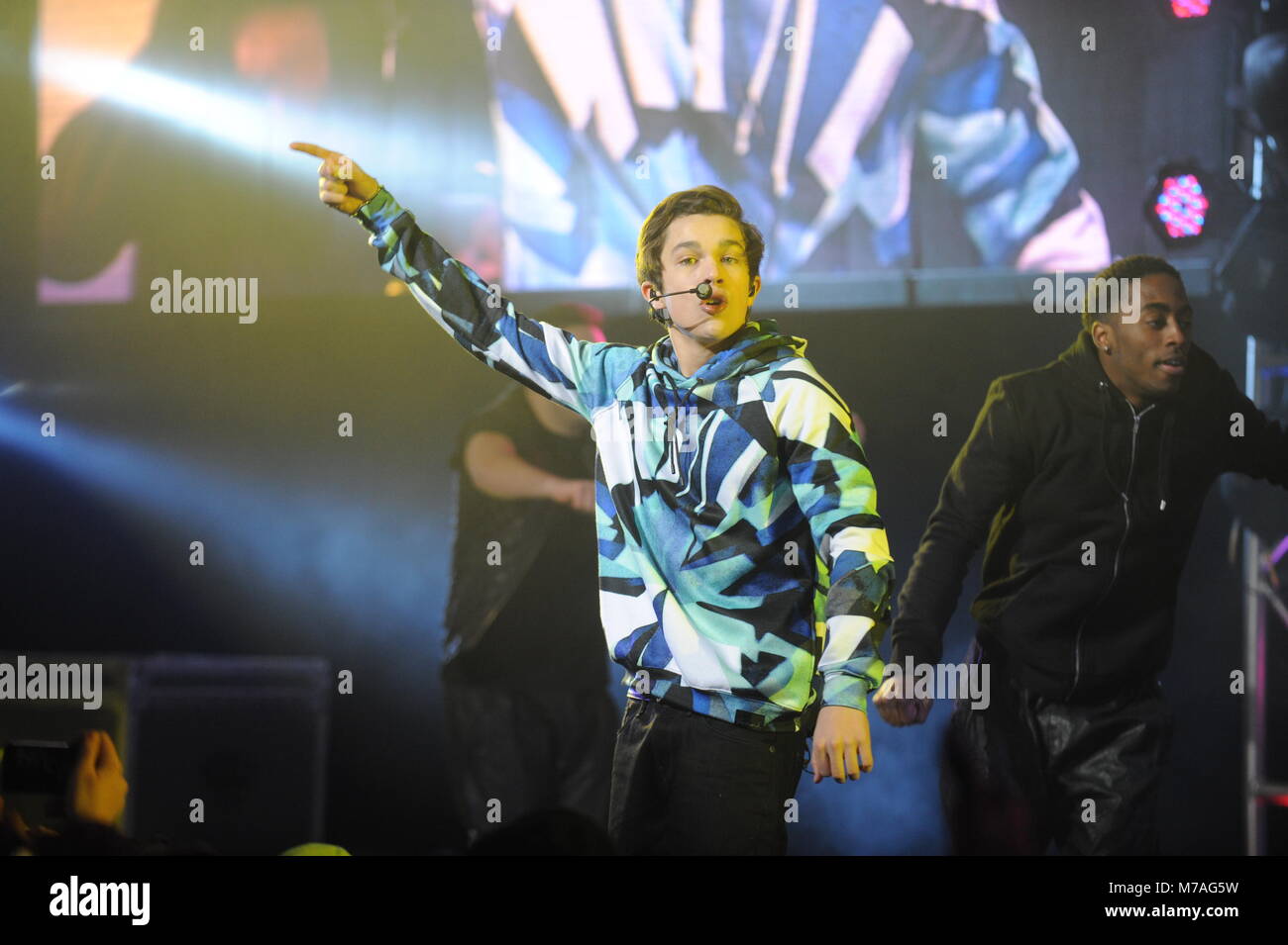 NEW YORK, NY - JANUARY 29: Austin Mahone performs onstage at the Aquafina FlavorSplash PepsiCo Super Bowl XLVIII celebration at Bryant Park on January 29, 2014 in New York City.   People:  Austin Mahone Stock Photo