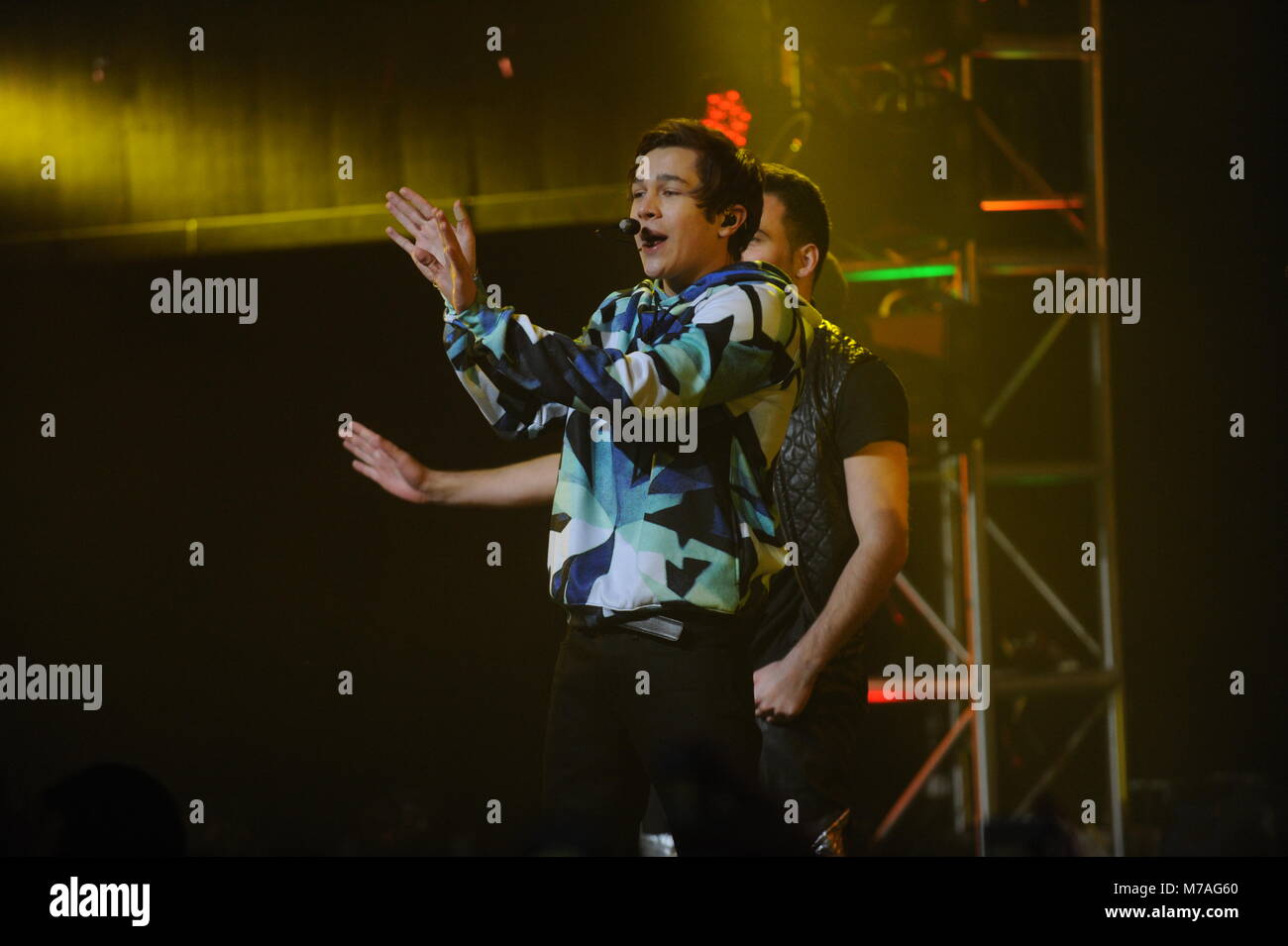 NEW YORK, NY - JANUARY 29: Austin Mahone performs onstage at the Aquafina FlavorSplash PepsiCo Super Bowl XLVIII celebration at Bryant Park on January 29, 2014 in New York City.   People:  Austin Mahone Stock Photo