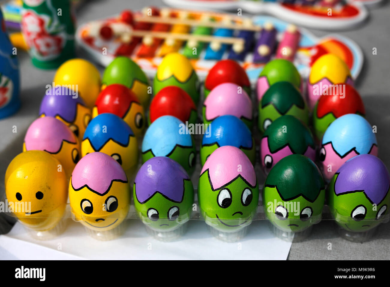 Funny Easter eggs. Colorful painted eggs with funny faces. Stock Photo