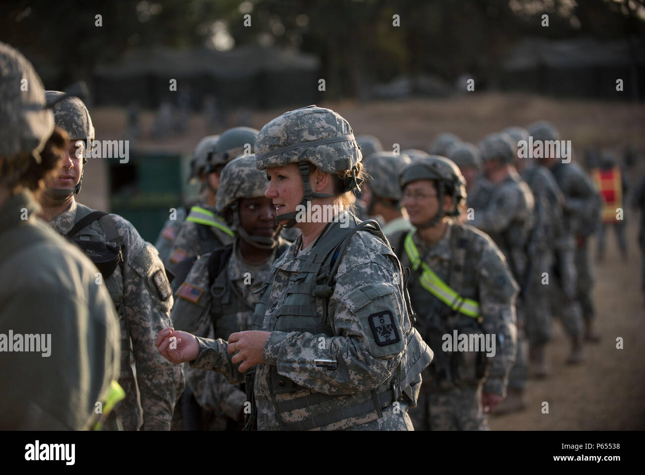 U.S. Army Reserve and National Guard Soldiers line up to eat breakfast in the field at Forward Operating Base Schoonover at Fort Hunter-Liggett, California, May 3. Approximately 80 units from across the U.S. Army Reserve, Army National Guard and active Army are participating in the 84th Training Command's second Warrior Exercise this year, WAREX 91-16-02, hosted by the 91st Training Division at Fort Hunter-Liggett, California. (U.S. Army photo by Master Sgt. Michel Sauret) Stock Photo