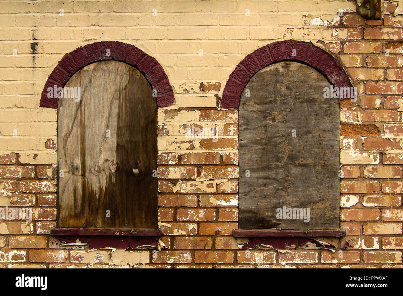 Urban decay, a rotting wall of a derelict building. Stock Photo