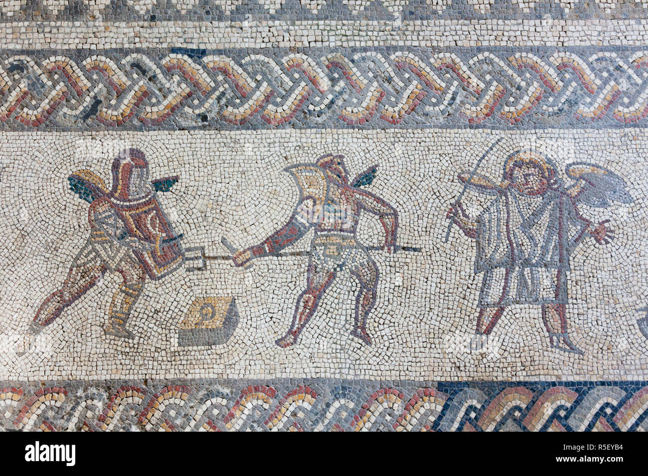 England, West Sussex, Bignor, Bignor Roman Villa, The Venus Room, Mosaic depicting Gladiators Stock Photo