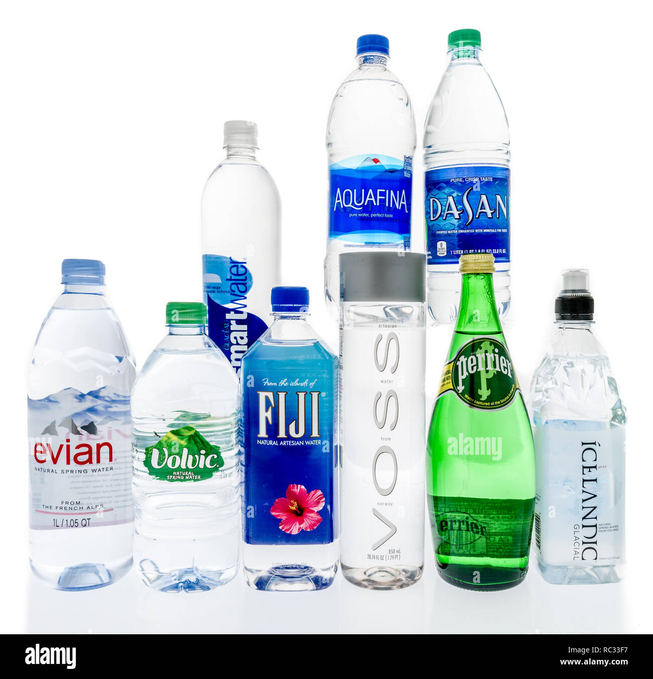 Winneconne, WI - 10 January 2019:  A collection of worlds most popular water including evian, volvic, fuji, voss, perrier, icelandic, dasani, aquafina Stock Photo