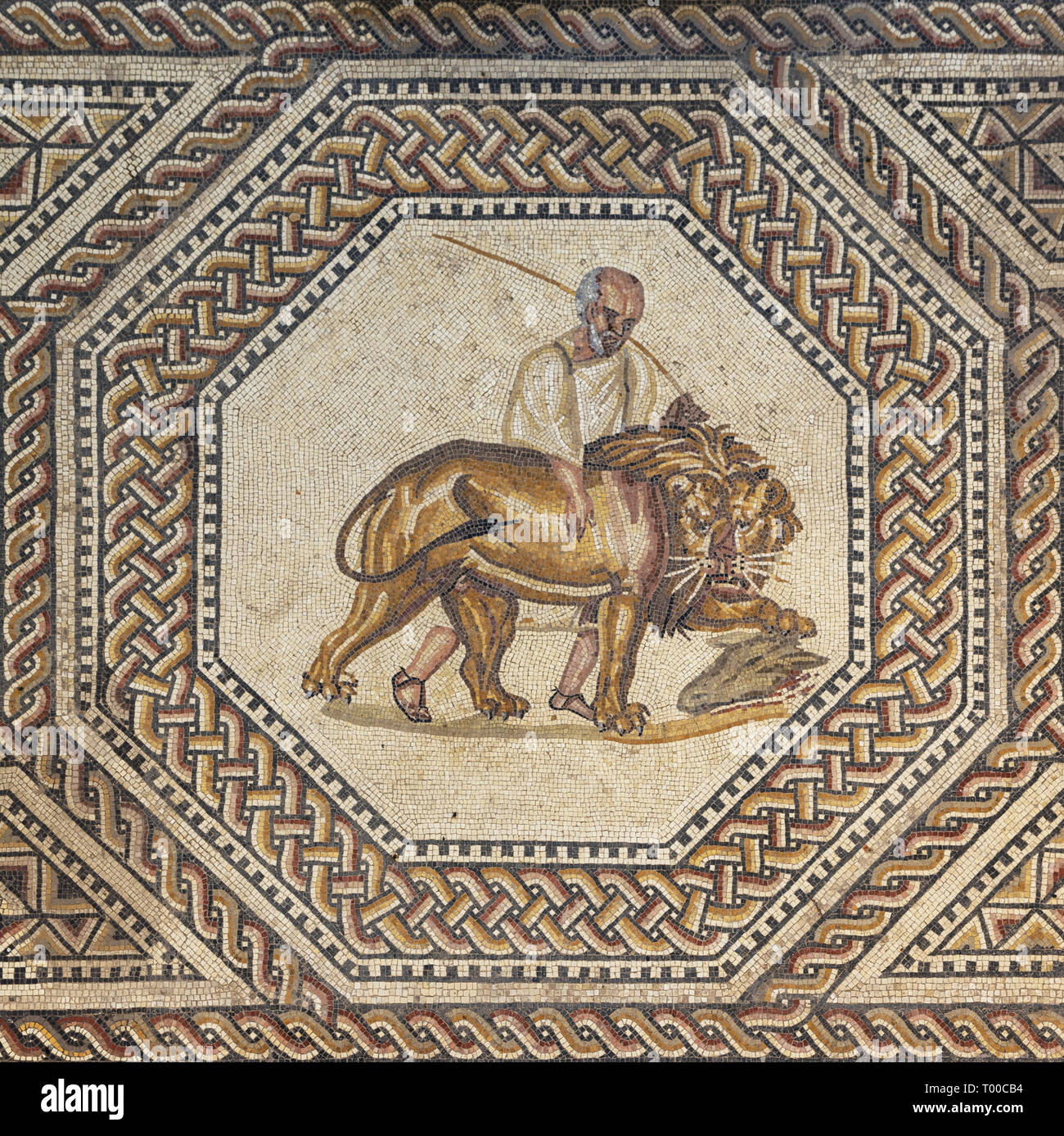 Editorial: NENNIG, SAARLAND, GERMANY, September 2, 2018 - A lion led away by its keeper depicted in the Roman villa in Nennig Stock Photo