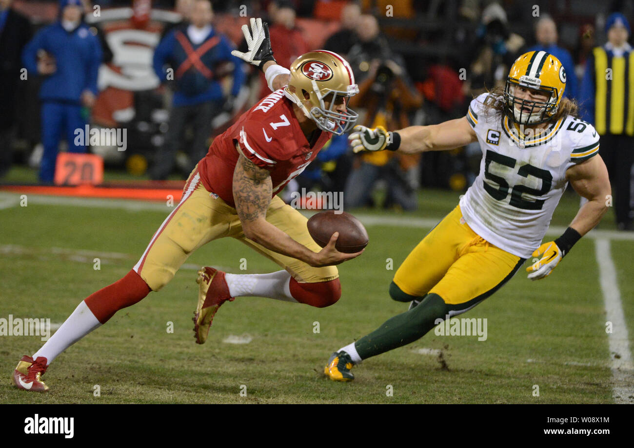 San Francisco 49ers QB Colin Kaepernick (7) sprints ahead as Green Bay Packers Clay Matthews closes in in the second quarter of the NFC Divisional Playoff at Candlestick Park in San Francisco on January 12, 2013. Kaepernick ran for 184 yards and two touchdowns as the 49ers defeated the Packers 45-31.   UPI/Terry Schmitt Stock Photo