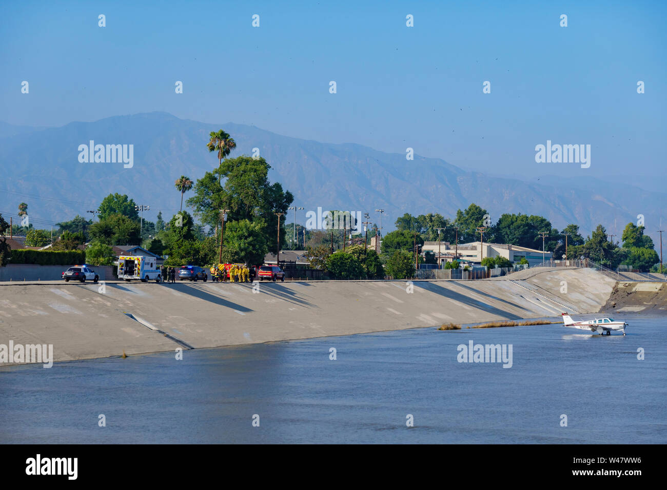 El Monte, JUN 27: Airplane landed at Rio Hondo wash canal, and police, firefigther were standby on JUN 27, 2019 at El Monte, Los Angeles County Stock Photo