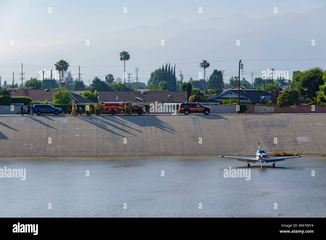 El Monte, JUN 27: Airplane landed at Rio Hondo wash canal, and police, firefigther were standby on JUN 27, 2019 at El Monte, Los Angeles County Stock Photo