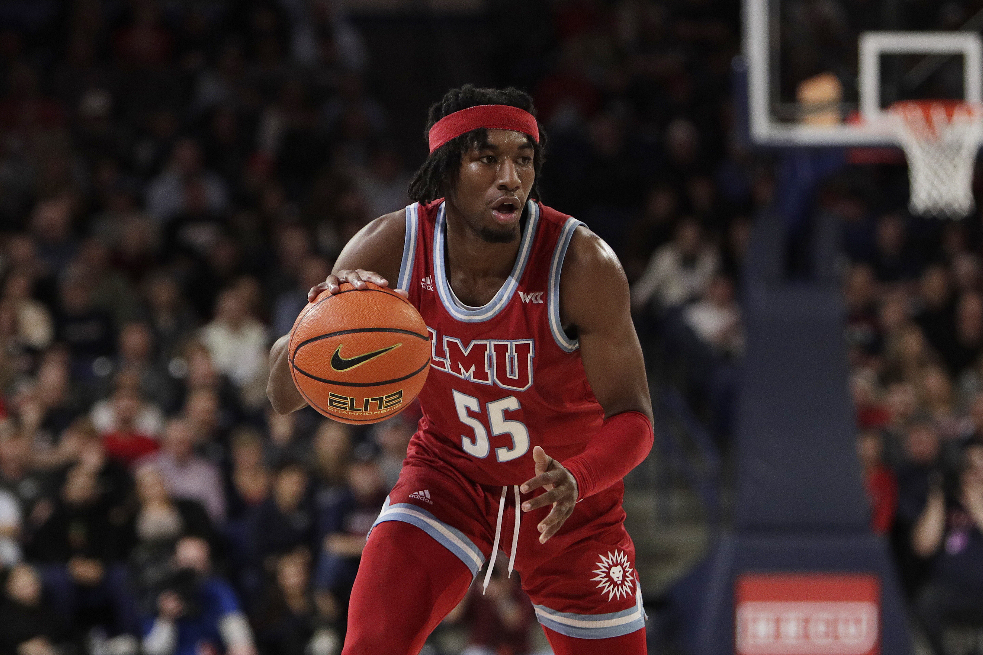 Loyola Marymount guard Dominick Harris controls the ball during the second half of an NCAA college basketball game against Gonzaga, Tuesday, Jan. 30, 2024, in Spokane, Wash. (AP Photo/Young Kwak)