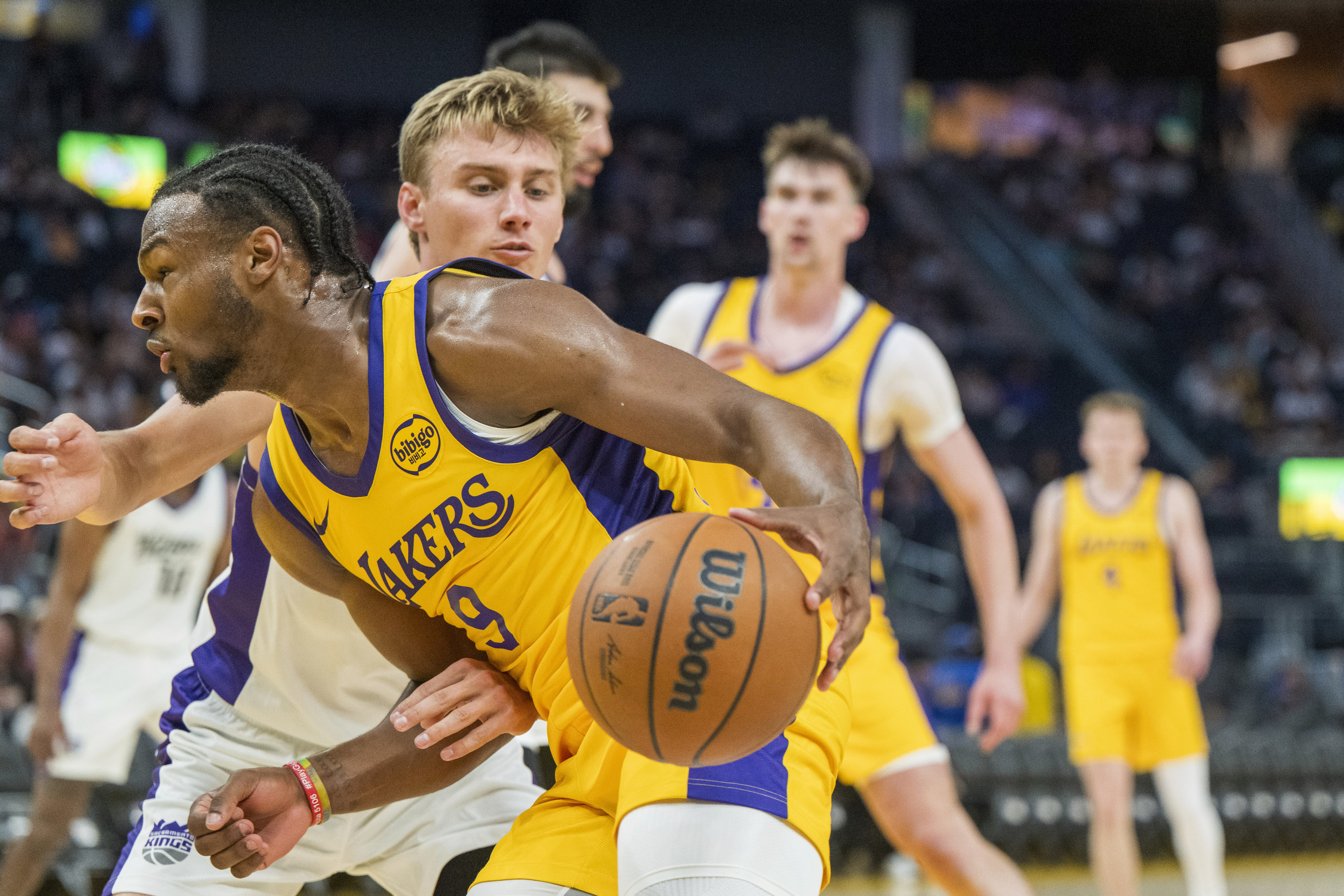 Los Angeles Lakers guard Bronny James (9) drives toward the basket during the second half.