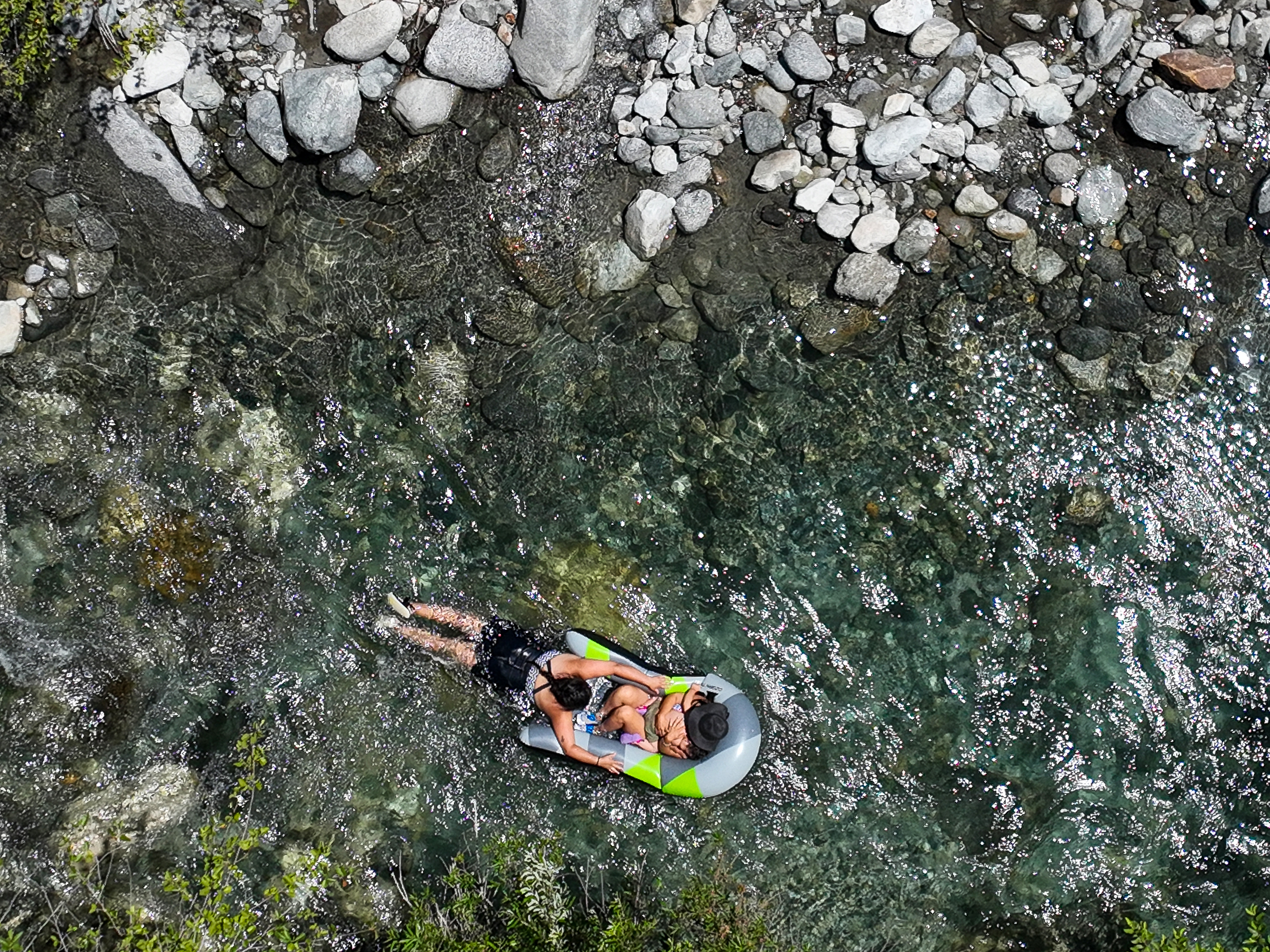 Lytle Creek, CA, Monday, July 1, 2024 - Temperatures in the 90's send people to cool off in Lytle Creek as construction workers build homes in Fontana. (Robert Gauthier/Los Angeles Times)