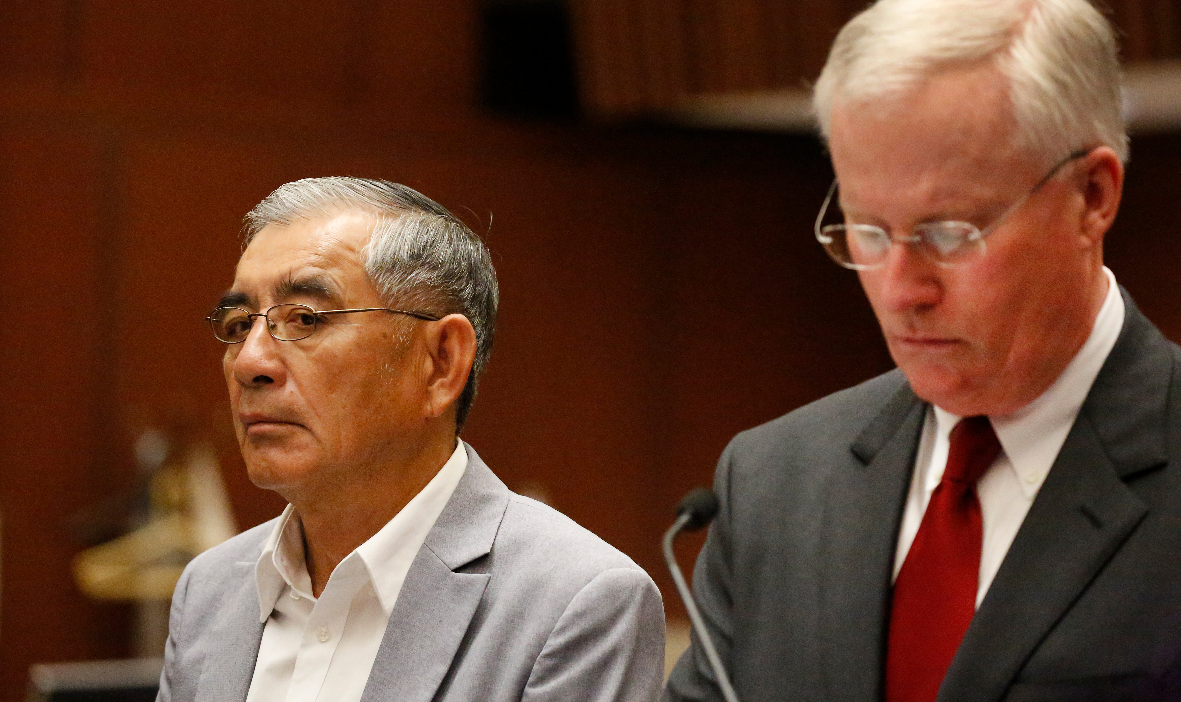 LOS ANGELES, CA â€“ APRIL 11, 2018: Samuel Leung, left, with his lawyer, Daniel V. Nixon, appear in Los Angeles Superior Court for arraignment April 11, 2018. Leung was charged with making illegal campaign donations in connection with an apartment project he was seeking to develop. (Al Seib / Los Angeles Times)