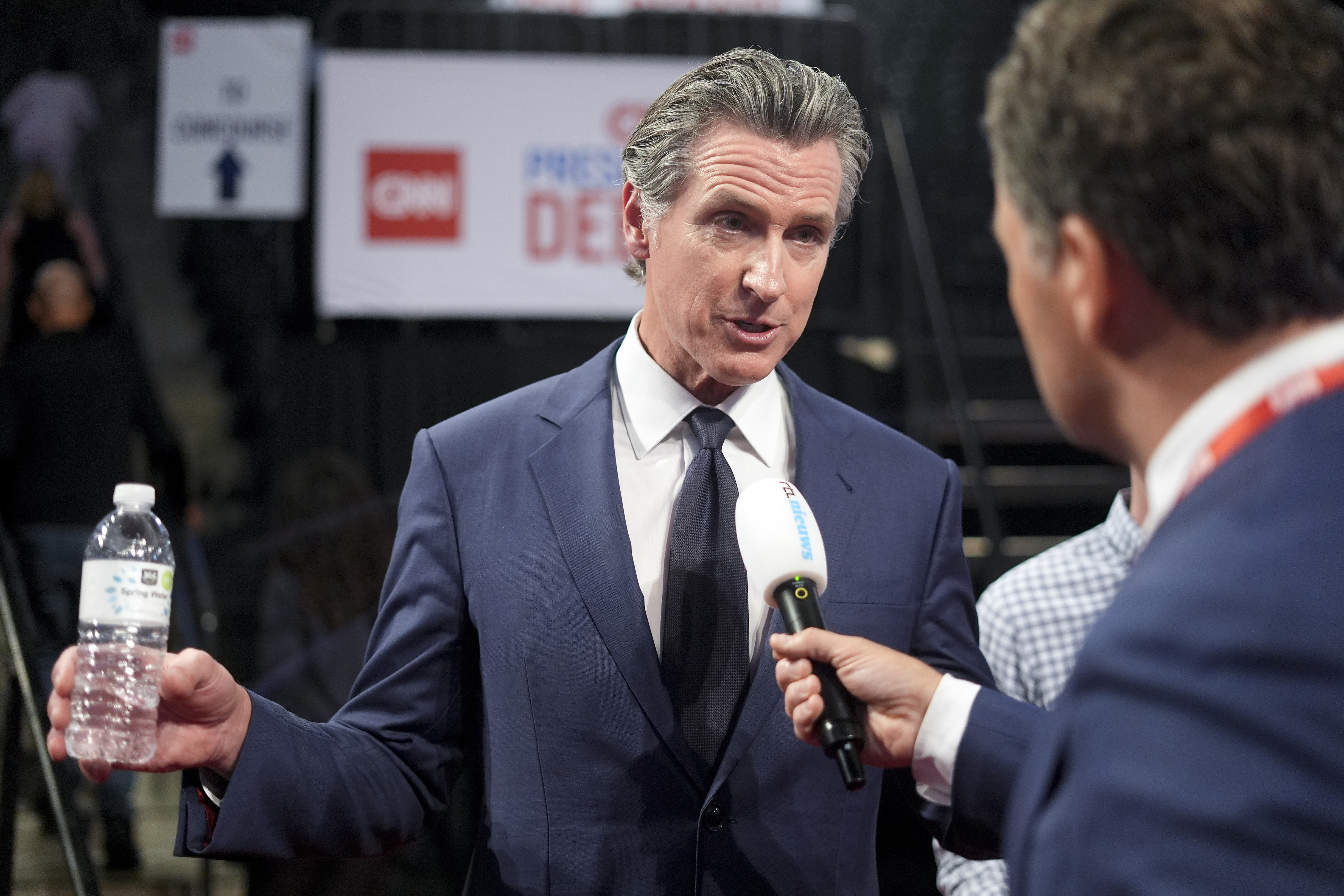 California Gov. Gavin Newsom speaks during an interview in the spin room before a presidential debate between President Joe Biden and Republican presidential candidate former President Donald Trump in Atlanta, Thursday, June 27, 2024. (AP Photo/Pablo Martinez Monsivais)