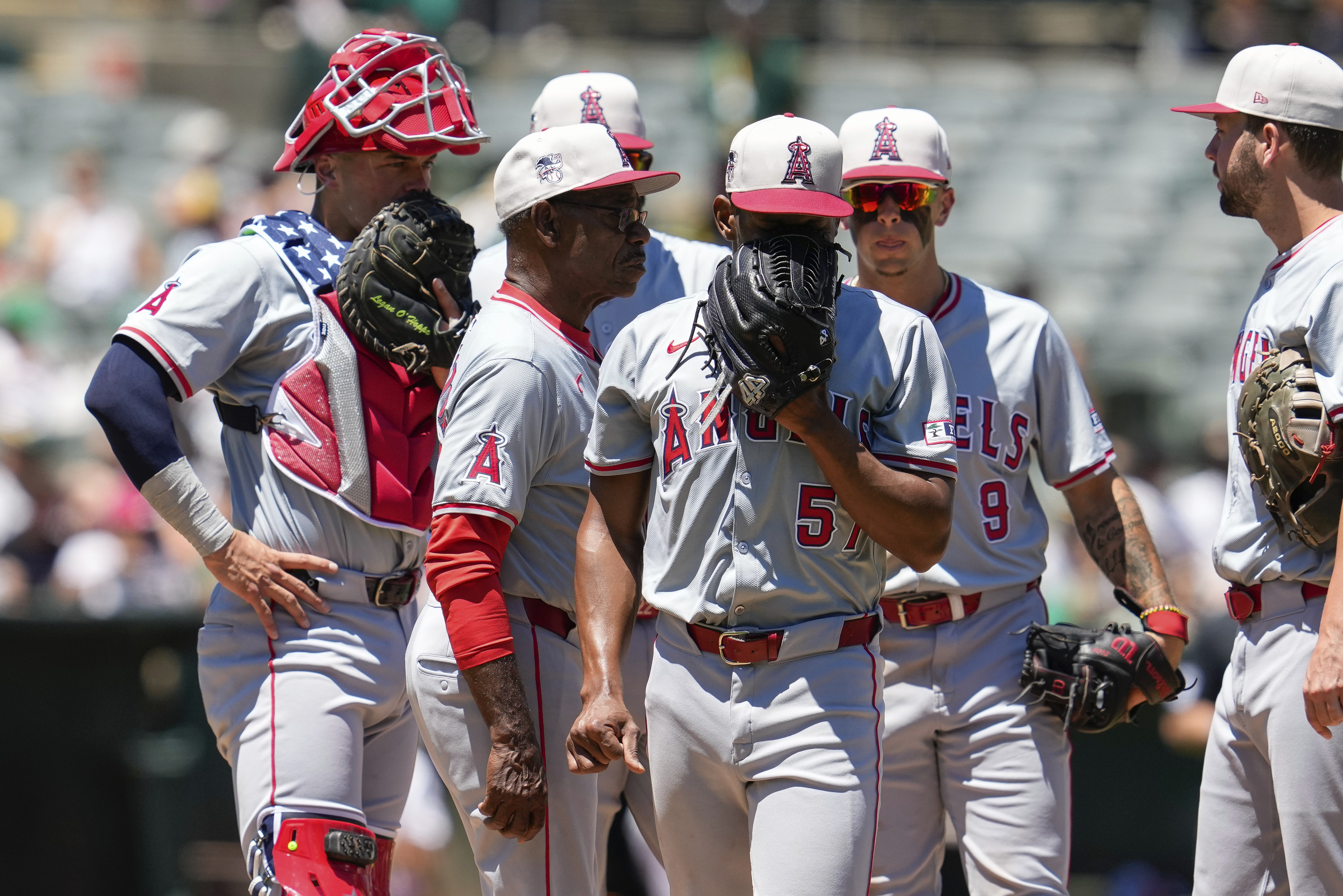 Los Angeles Angels pitcher Roansy Contreras, center, exits during the third inning.